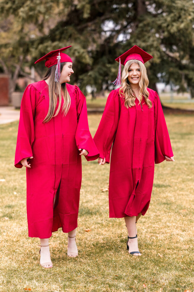 Best friend cap and gown photos with spring snow in Berthoud
