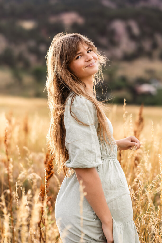 Film-inspired color portrait of Colorado wedding photographer Eden Alley at Chautauqua Park, photographed by Heather Lilly Photography.