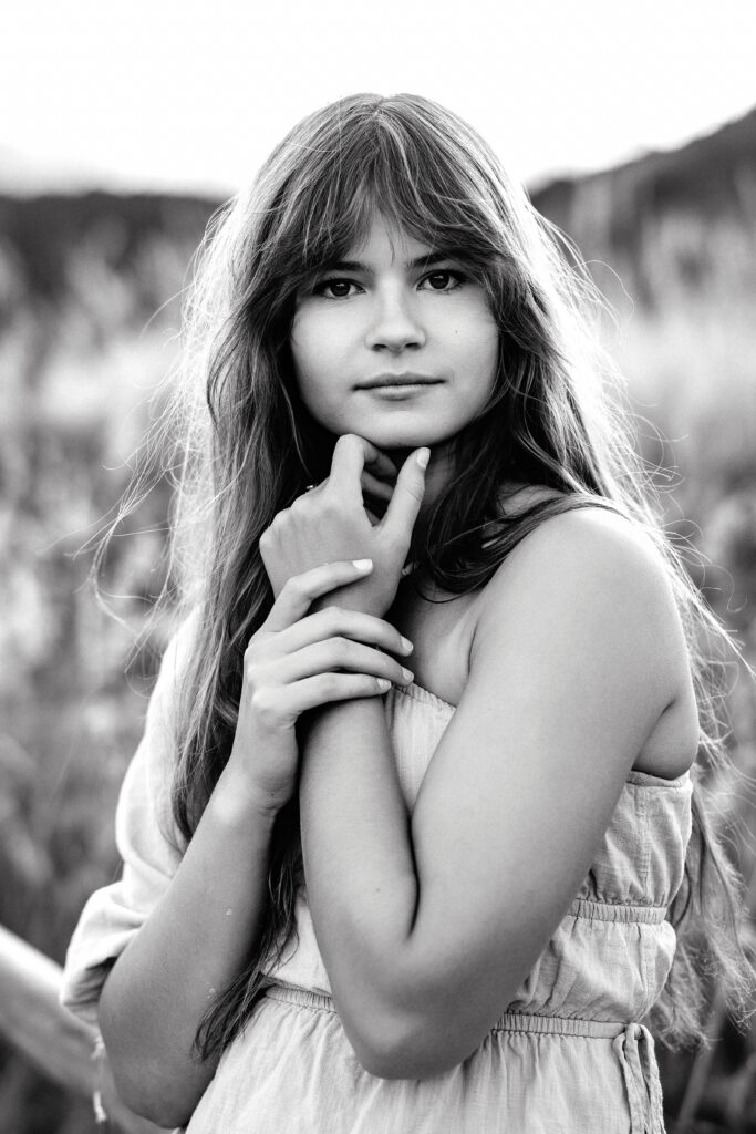 Black and white headshot of Colorado wedding photographer Eden Alley in Boulder, natural editorial portrait.