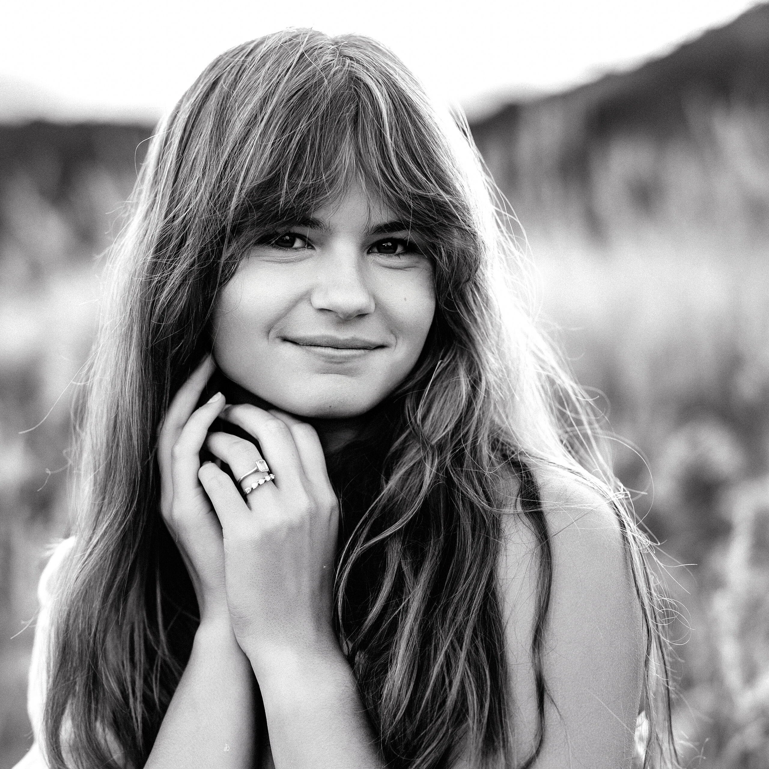 Timeless black and white portrait of Colorado wedding photographer Eden Alley with soft expression and natural light.