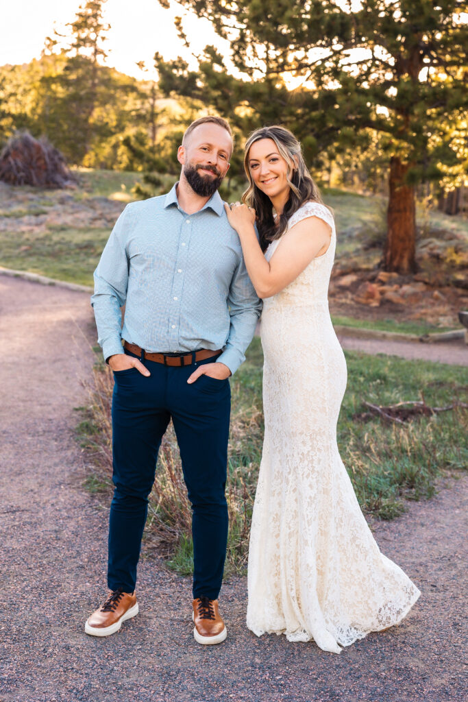 Husband and wife during vow renewal at Lily Lake in Estes Park Colorado, photographed by Northern Colorado photographer Heather Lilly at golden hour in the mountains.