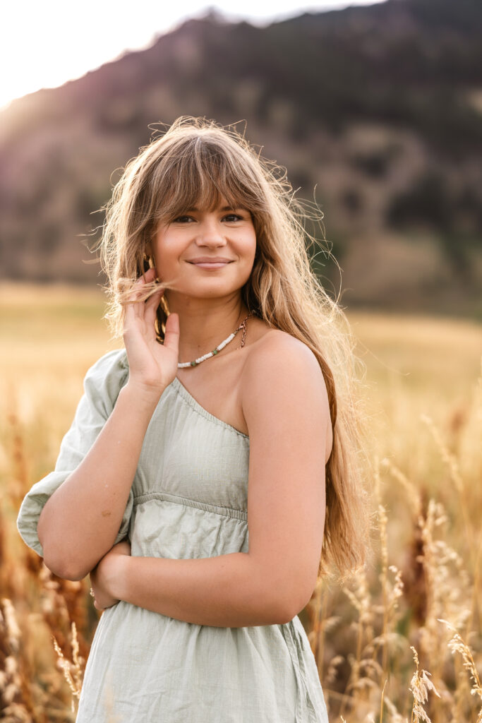 Film-inspired portrait of Eden Alley in tall golden grasses, natural boho vibe, Heather Lilly Photography.
