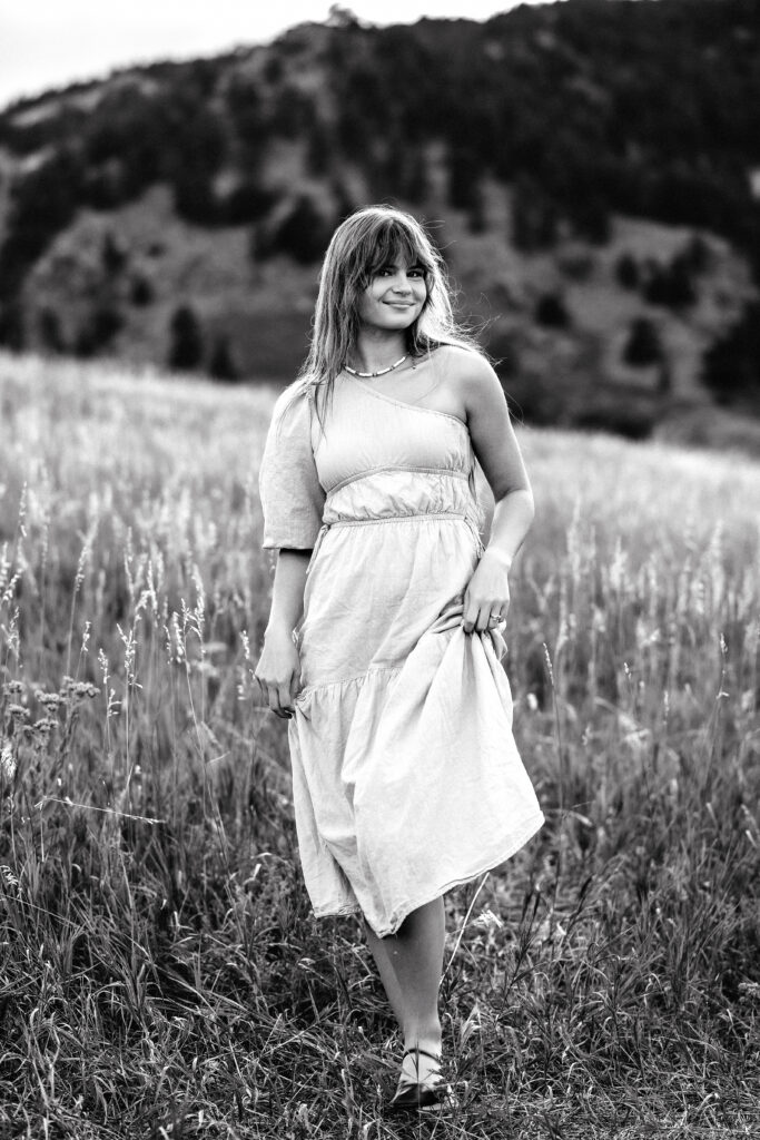 Film-inspired black and white headshot of Colorado wedding photographer Eden Alley, timeless editorial vibe.