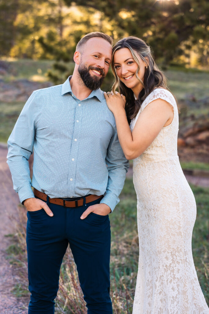 Husband and wife during vow renewal at Lily Lake in Estes Park Colorado, photographed by Northern Colorado photographer Heather Lilly at golden hour in the mountains.