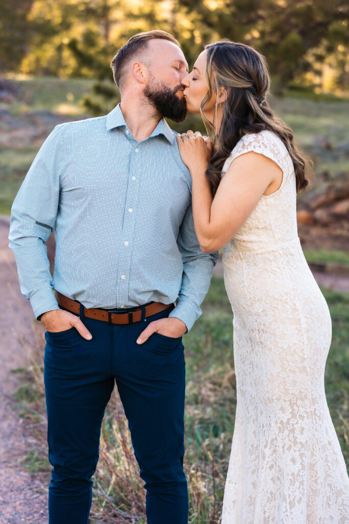 Husband and wife during vow renewal at Lily Lake in Estes Park Colorado, photographed by Northern Colorado photographer Heather Lilly at golden hour in the mountains.