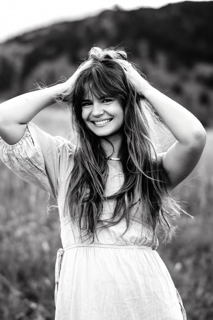 Black and white editorial style headshot of Eden Alley, Colorado wedding and portrait photographer.