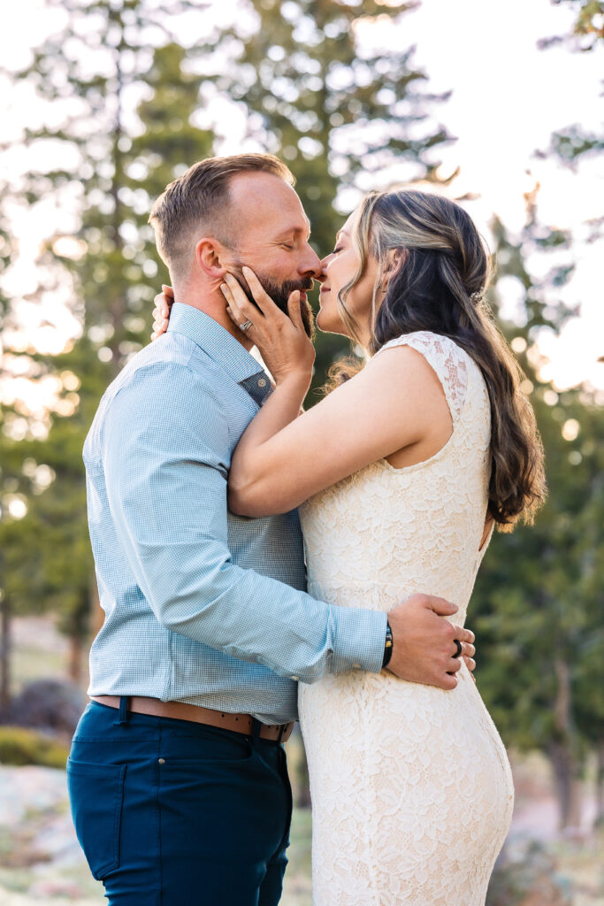 Husband and wife during vow renewal at Lily Lake in Estes Park Colorado, photographed by Northern Colorado photographer Heather Lilly at golden hour in the mountains.