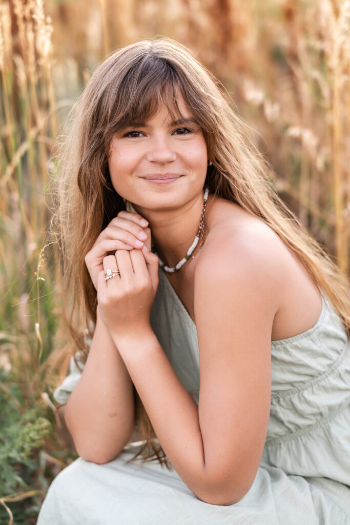 Color headshot of Eden Alley with soft expression, natural film-inspired tones by Heather Lilly Photography.