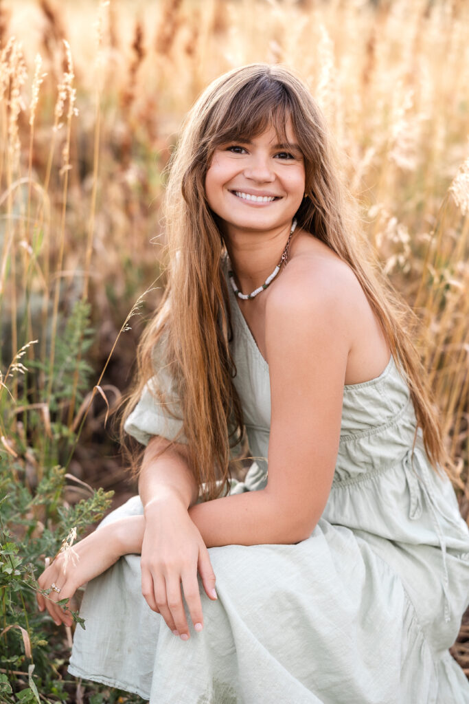 Color headshot of Eden Alley with soft expression, natural film-inspired tones by Heather Lilly Photography.