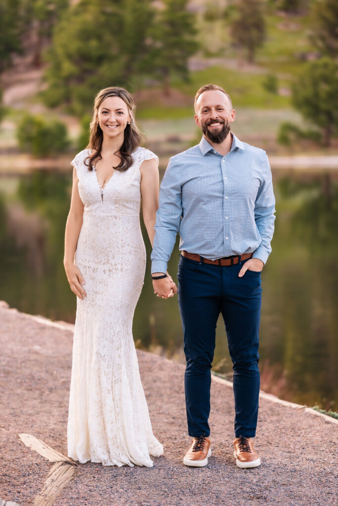 Husband and wife during vow renewal at Lily Lake in Estes Park Colorado, photographed by Northern Colorado photographer Heather Lilly at golden hour in the mountains.