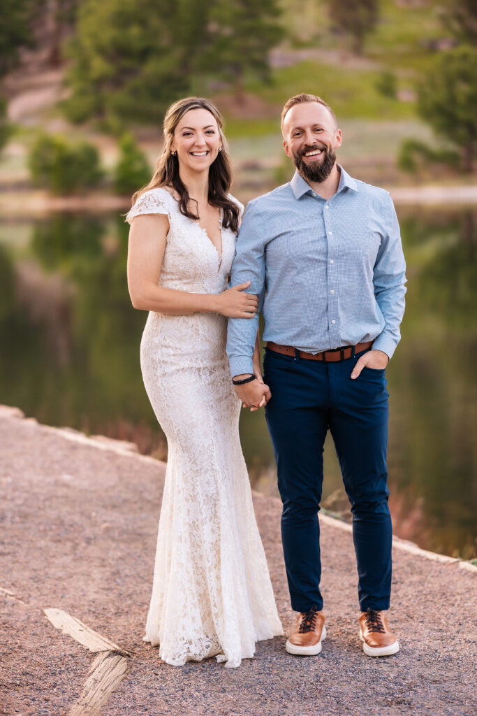 Husband and wife during vow renewal at Lily Lake in Estes Park Colorado, photographed by Northern Colorado photographer Heather Lilly at golden hour in the mountains.