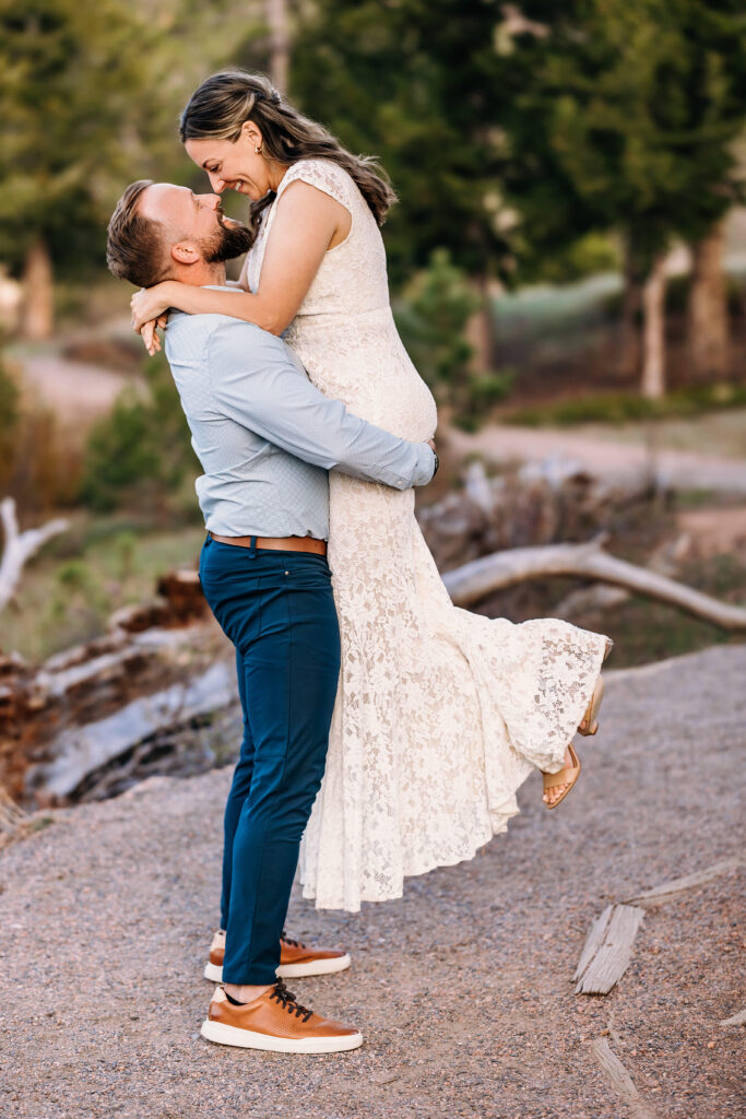 Husband and wife during vow renewal at Lily Lake in Estes Park Colorado, photographed by Northern Colorado photographer Heather Lilly at golden hour in the mountains.