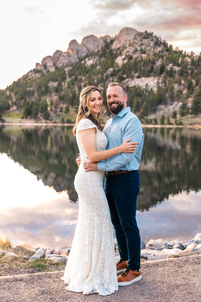 Husband and wife portraits during vow renewal at Lily Lake in Estes Park Colorado, photographed by Northern Colorado photographer Heather Lilly at golden hour in the mountains. 