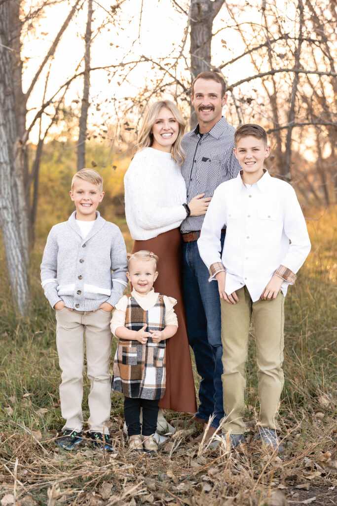 family of five portrait during golden hour mini session in Laramie Wyoming